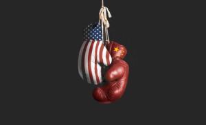 U.S. and China boxing gloves, each with country flag 